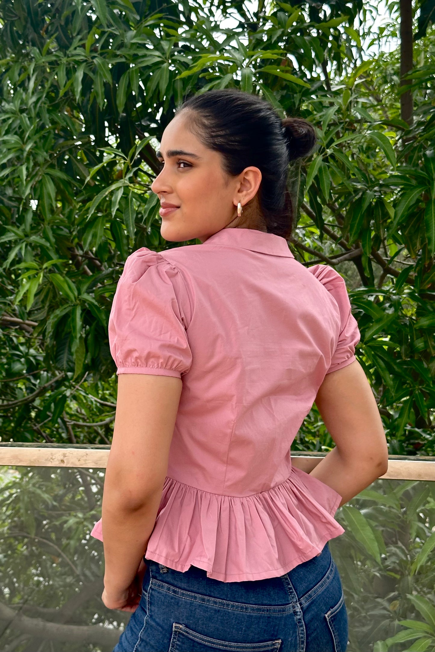 Sweet and feminine, this dusty pink top